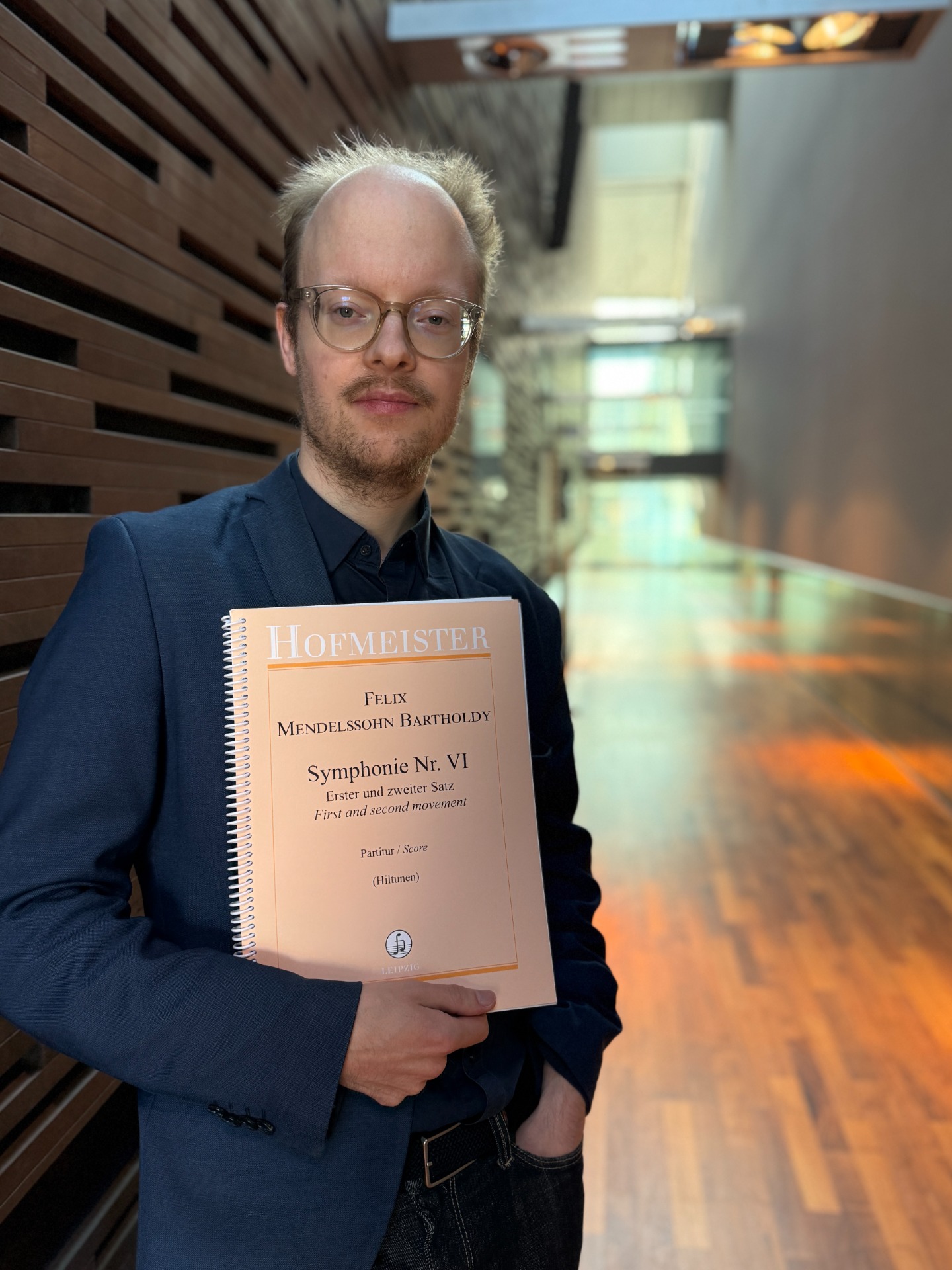 Mr. Hiltunen with a just-published score at the Helsinki Music Centre on Sunday, September 20, 2026. (C) Johanna Pätsi